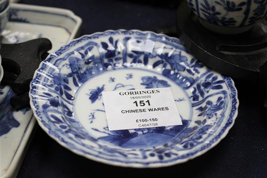 A Chinese blue and white tea bowl and saucer and two jars, Kangxi, some damage largest diameter 11cm